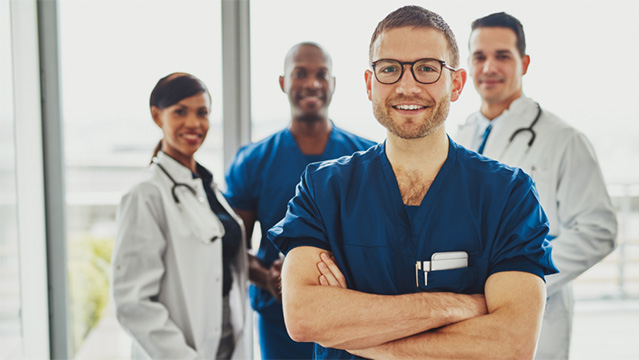 Four Doctors standing together